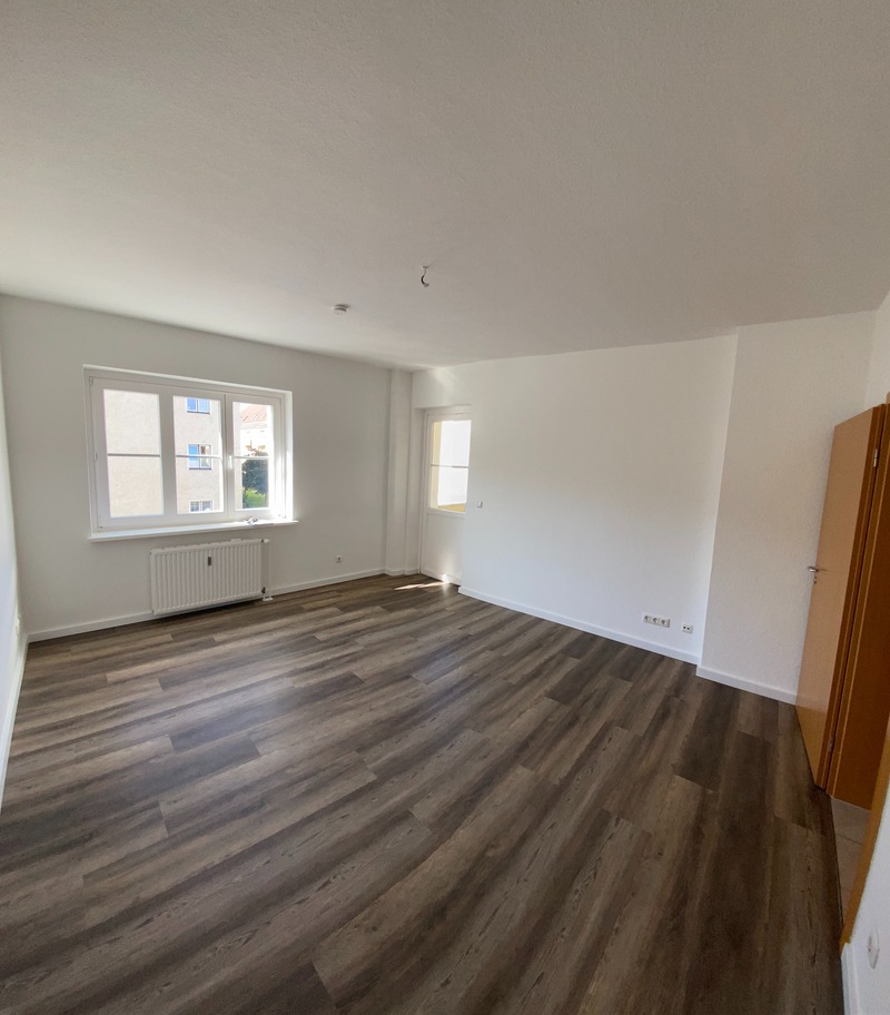 Wohnen im Grünen: Charmante 2-Raum Wohnung mit Balkon in ruhiger Curiesiedlung! - Photo 4