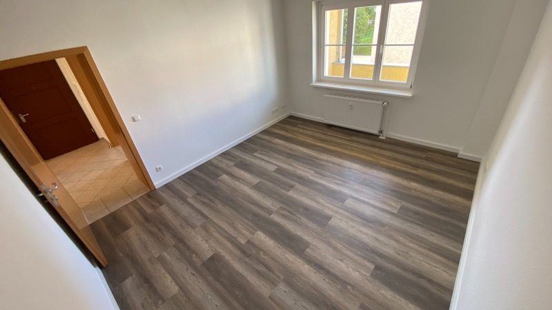 Wohnen im Grünen: Charmante 2-Raum Wohnung mit Balkon in ruhiger Curiesiedlung! - Photo 5
